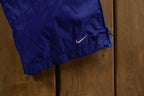 Vintage 1990s Blue Nike Mini Swoosh Track Pants Size L