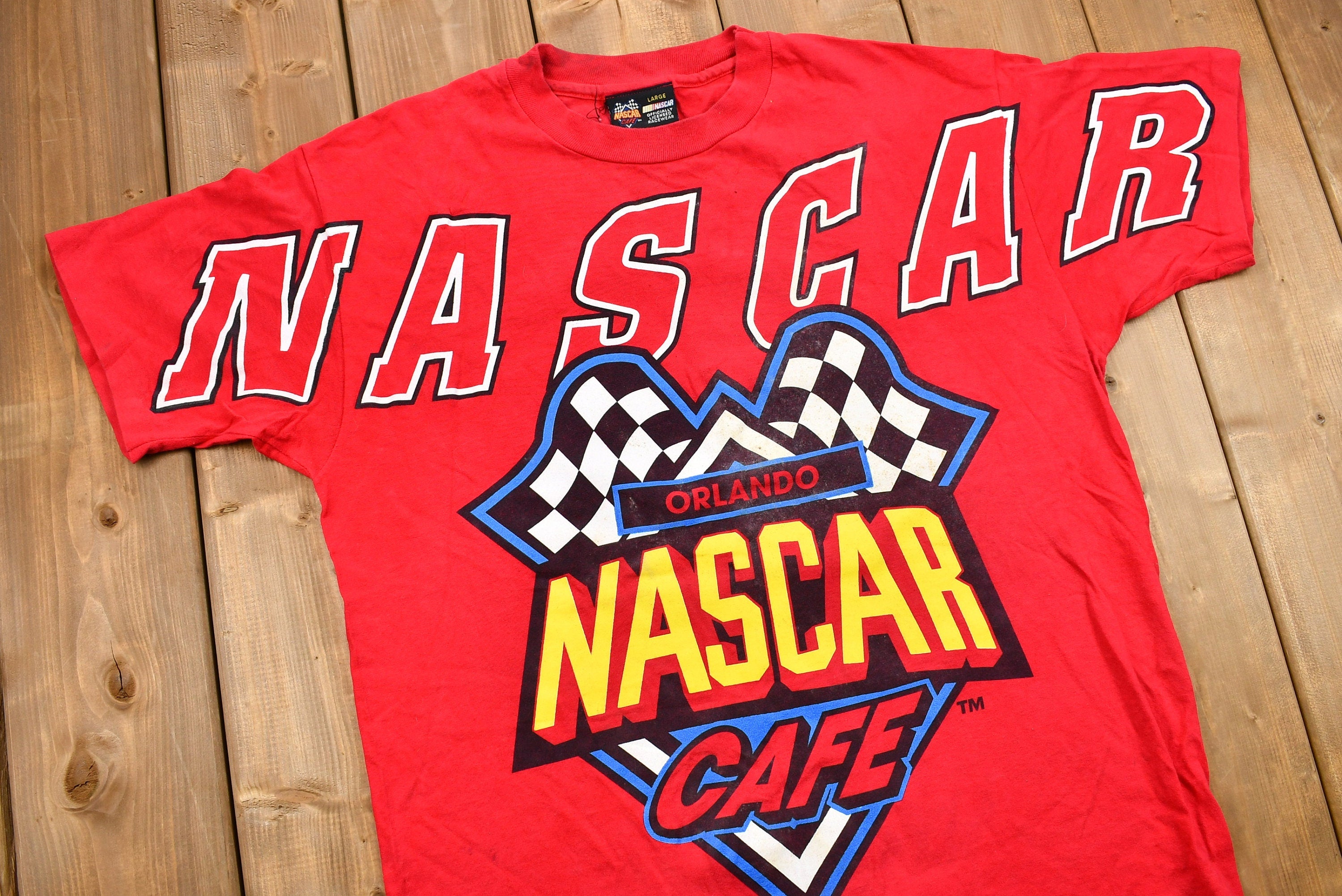 Vintage 1990s NASCAR Café Orlando Graphic T-Shirt / Single Stitch / Racing / 90s Streetwear / Life's A Race The Best Times Win / Sportswear