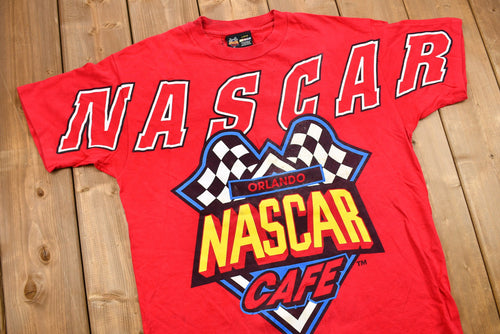 Vintage 1990s NASCAR Café Orlando Graphic T-Shirt / Single Stitch / Racing / 90s Streetwear / Life's A Race The Best Times Win / Sportswear