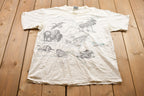 Vintage 1990s American Outback Apparel USA Map Animals Graphic T-Shirt