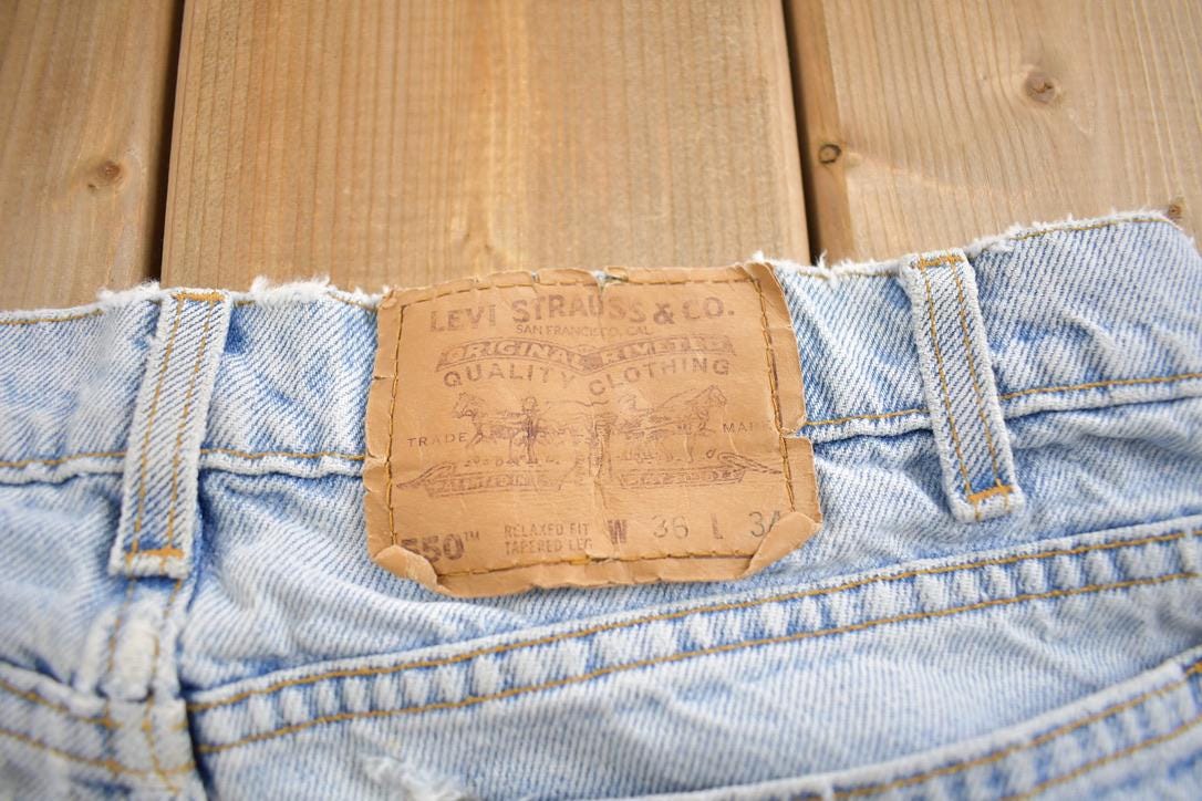 Vintage 1990s Levi's 550 Orange Tab Jeans Size 36x34