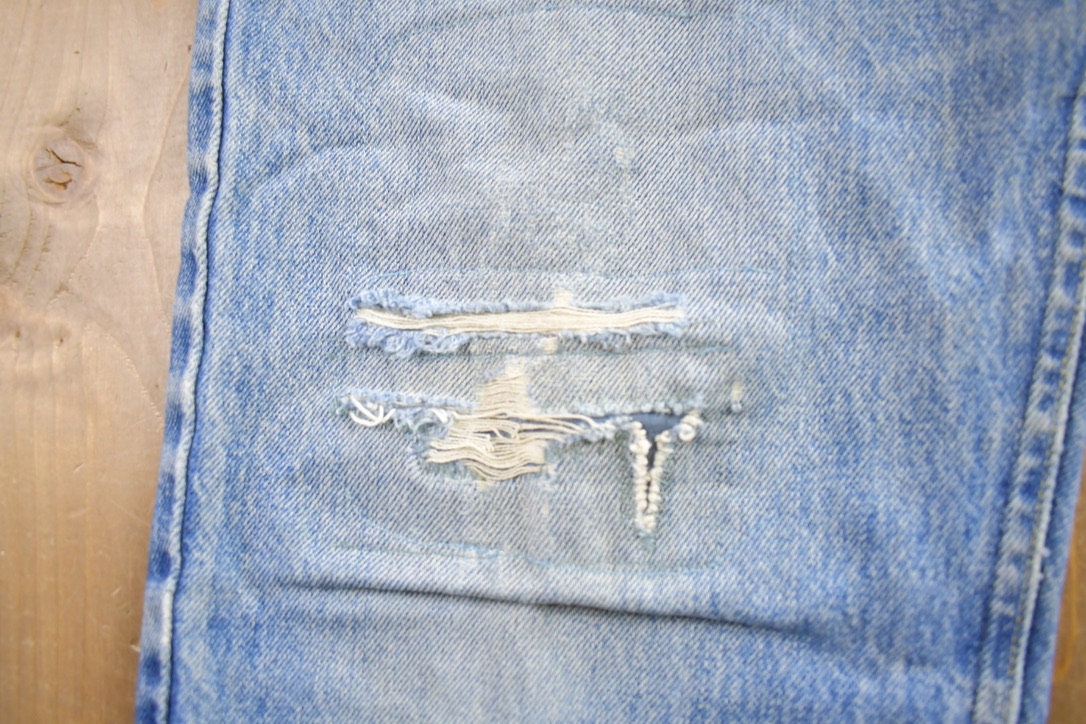 Vintage 1980s Distressed Lee Denim Jeans Made In USA Size 34x30
