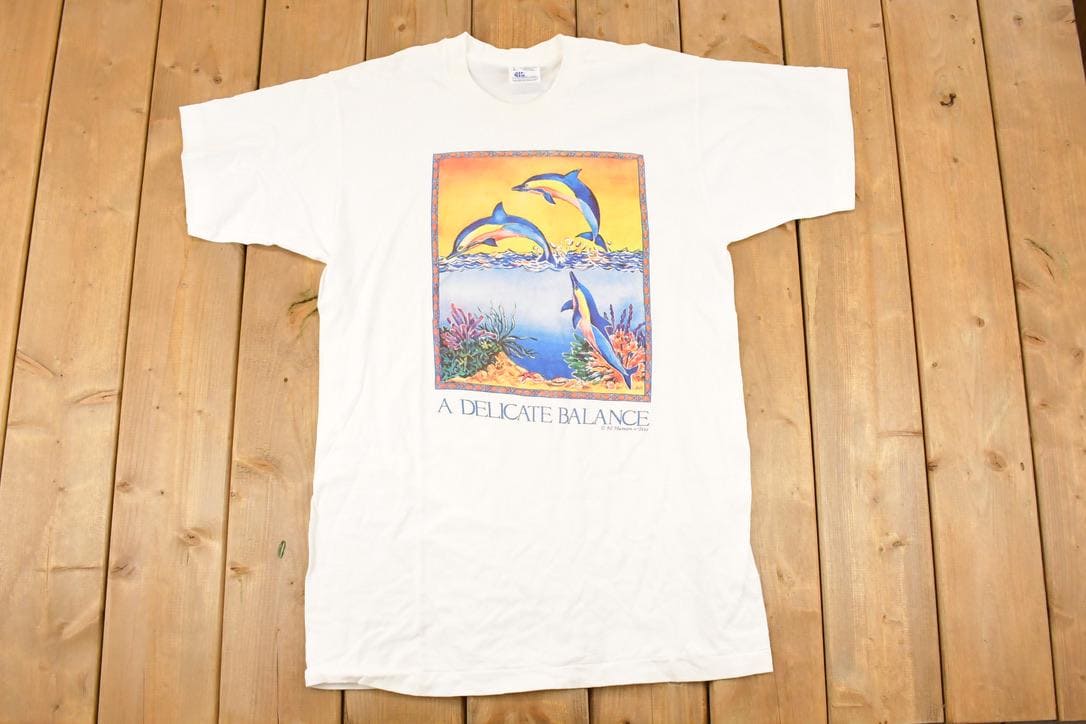 Vintage 1992 Delicate Balance Dolphin Graphic Print Souvenir Ocean T-Shirt Men's M