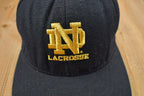 Vintage 1990s University Of Notre Dame Lacrosse Collegiate Champion Snap Back Hat
