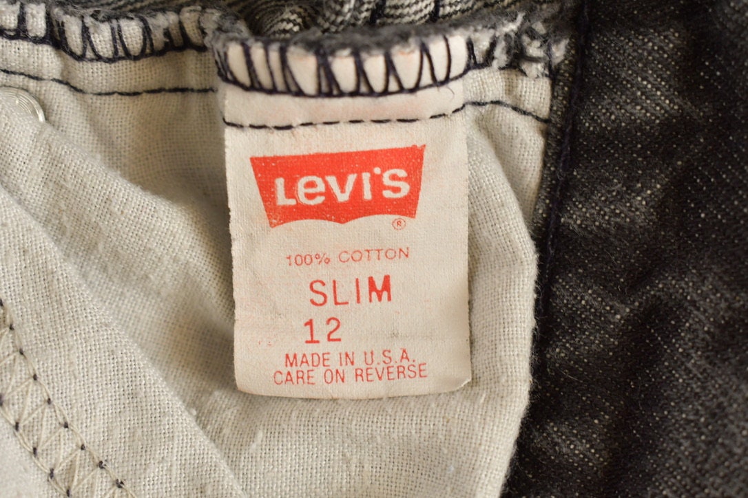 Vintage 1990s Youth Levi Black Tab Jeans Size 23 x 27