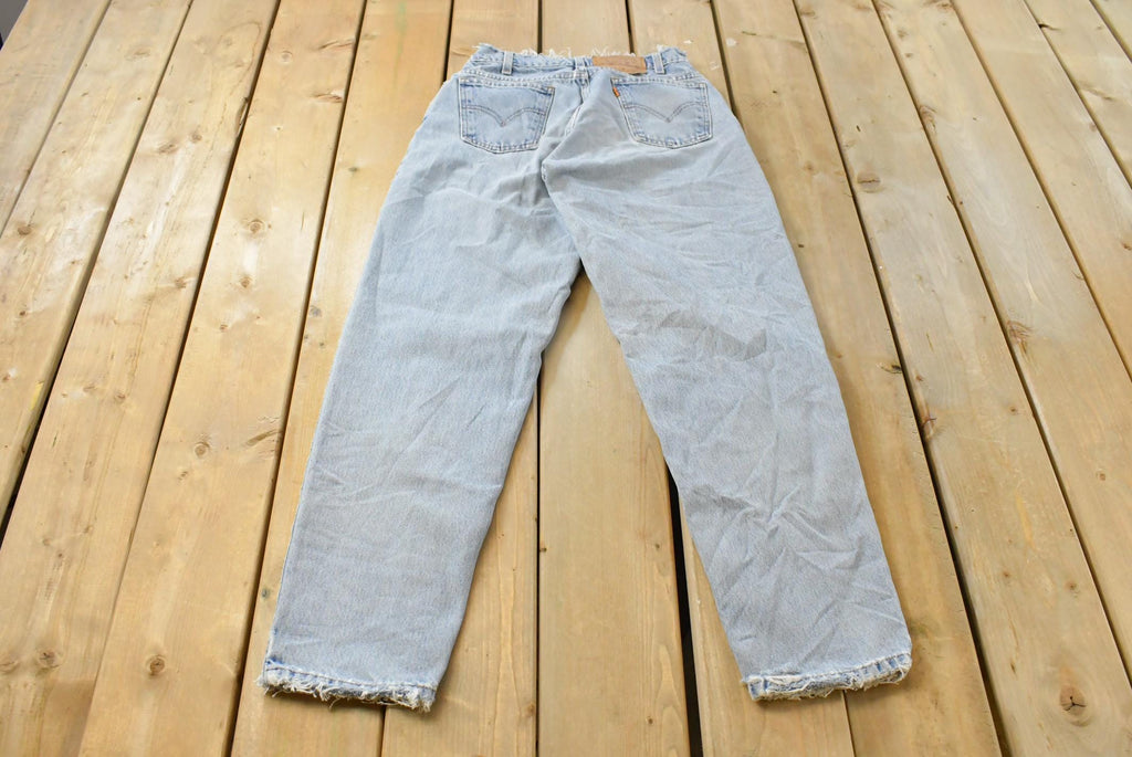 Vintage 1990s Levi's 560 Loose Tapered Denim Jeans Men's 26 x 31 / 90s Levi's / Distressed Sun Faded Jeans