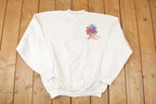 Vintage 1990s Planet Hollywood Arnold Schwarzenegger Graphic Print Christmas Tree Crewneck Sweatshirt Mens XL