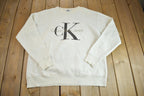 Vintage 1990s Calvin Klein Jeans Embroidered Crewneck Sweatshirt Made In Canada