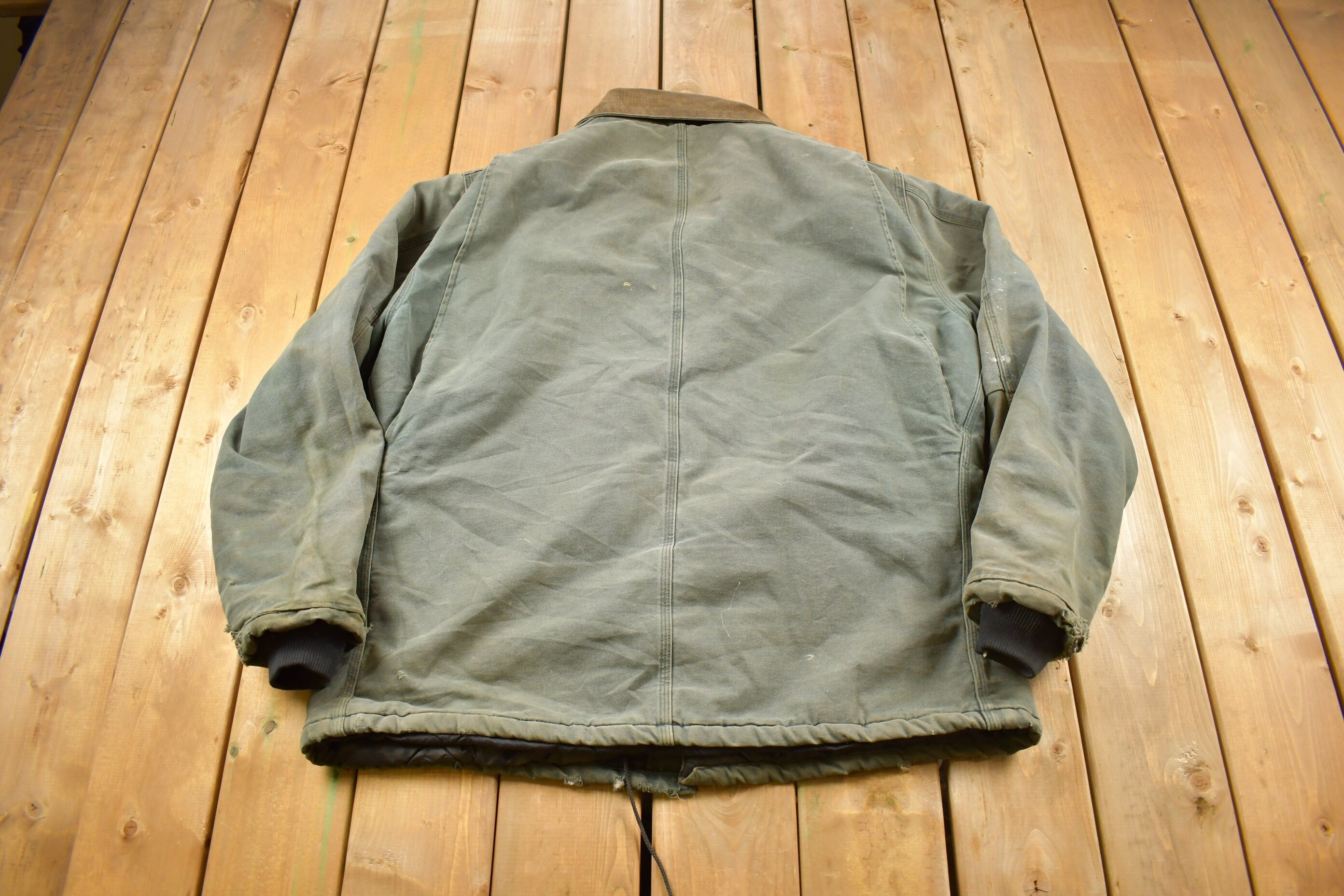 Vintage 1990s Faded Green Quilt Lined Thrashed Carhartt Traditional Jacket Workwear