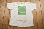 Vintage 1990s Starve A Mosquito LifeShare Graphic T Shirt