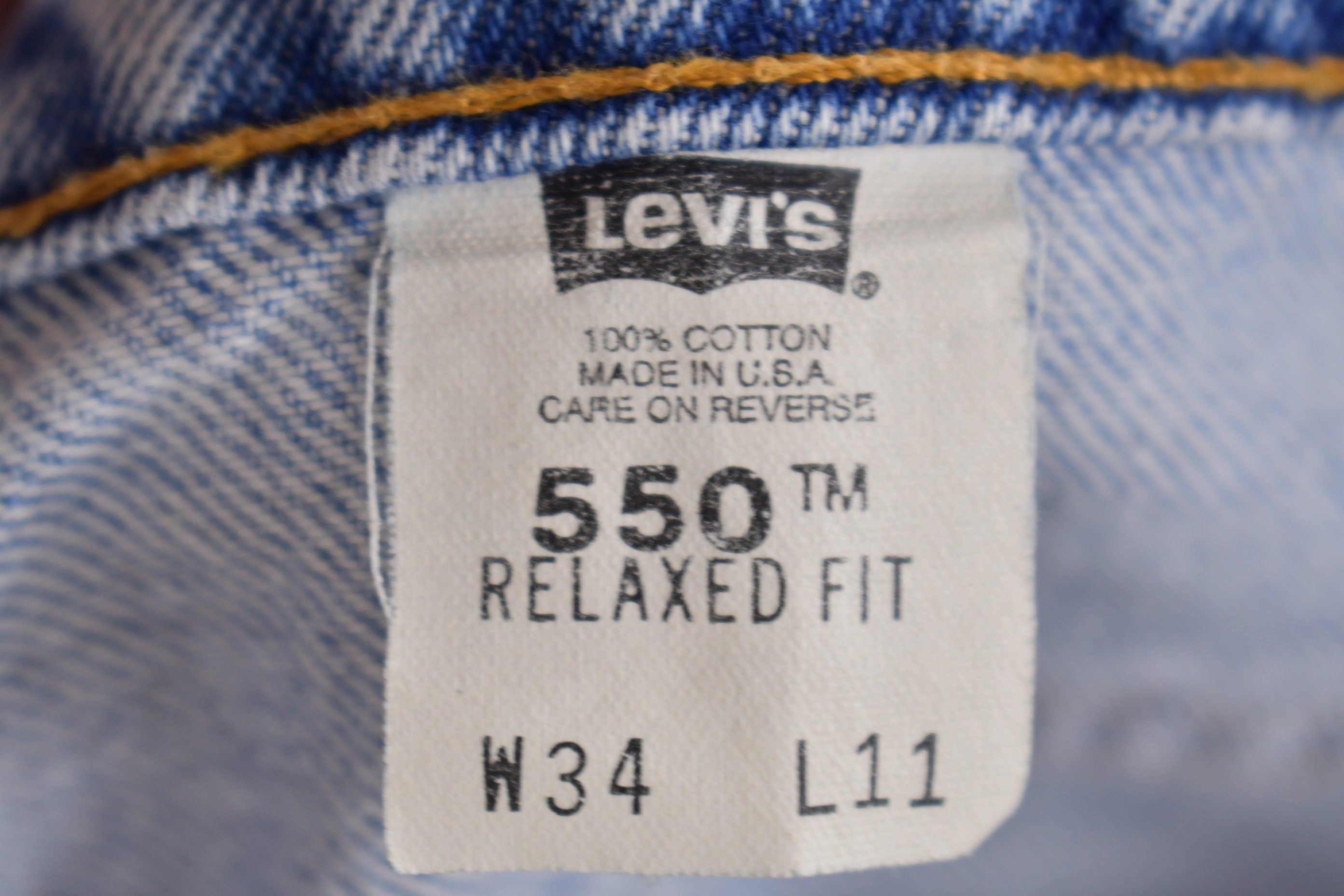 Vintage 1990s Levi's 550 Orange Tab Denim Shorts Size 31 x 6.5