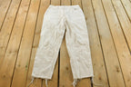 Vintage 1990s Levi's 550 Relaxed Fit Tapered Leg Denim White Jeans Size 22 x 24.5 / 90s Levi's / Made in USA / Streetwear