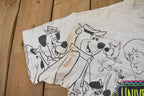 Vintage 1990s Universal Studios All Over Print Graphic T-Shirt