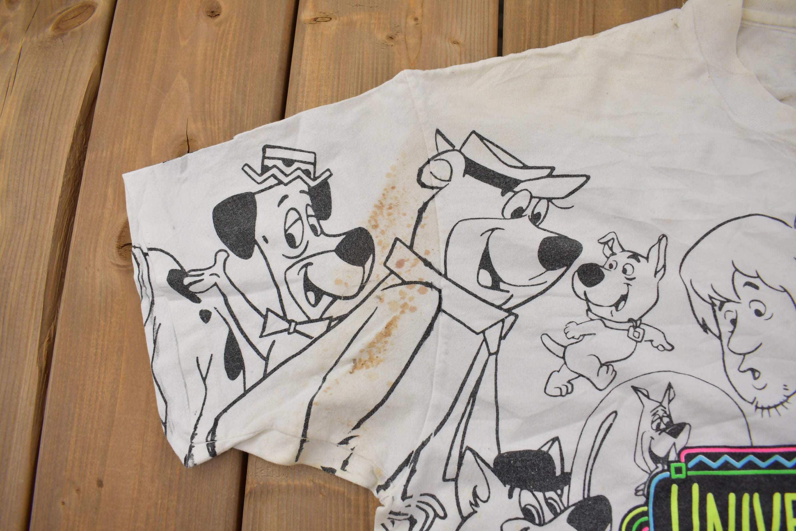 Vintage 1990s Universal Studios All Over Print Graphic T-Shirt