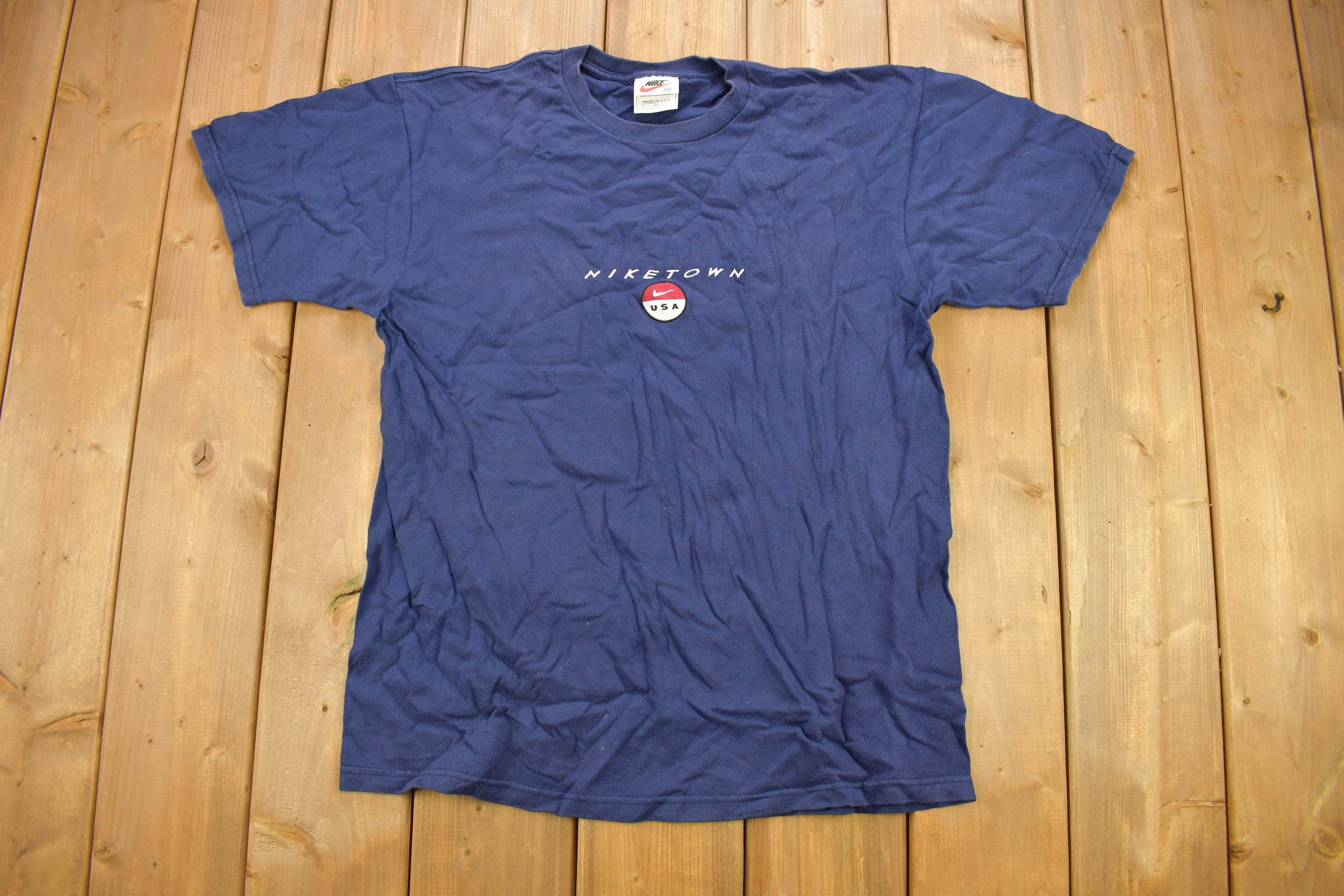 Vintage 1990s Nike Town USA Embroidered T Shirt