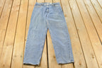 Vintage 1990s Levi's 560 Loose Straight Denim Jeans Women's 32 x 31 / 90s Levi's / Distressed Sun Faded Jeans