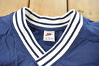 Vintage 1990s Nike Embroidered Mini Swoosh Pullover Windbreaker Men's XL