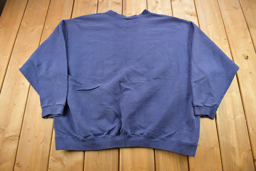 Vintage 1990s Nike Embroidered Mini Swoosh Blue Crewneck Sweatshirt