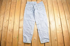 Vintage 1990s Levi 560 Red Tab Jeans Size 35 x 28