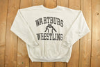 Vintage 1990s Wartburg Wrestling Champion Premium Reverse Weave Sweatshirt