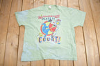 Vintage 1990s A Women's Place Is On The Court" Graphic T Shirt