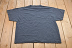 Vintage 1990s Strum A Guitar Funny Graphic T-Shirt