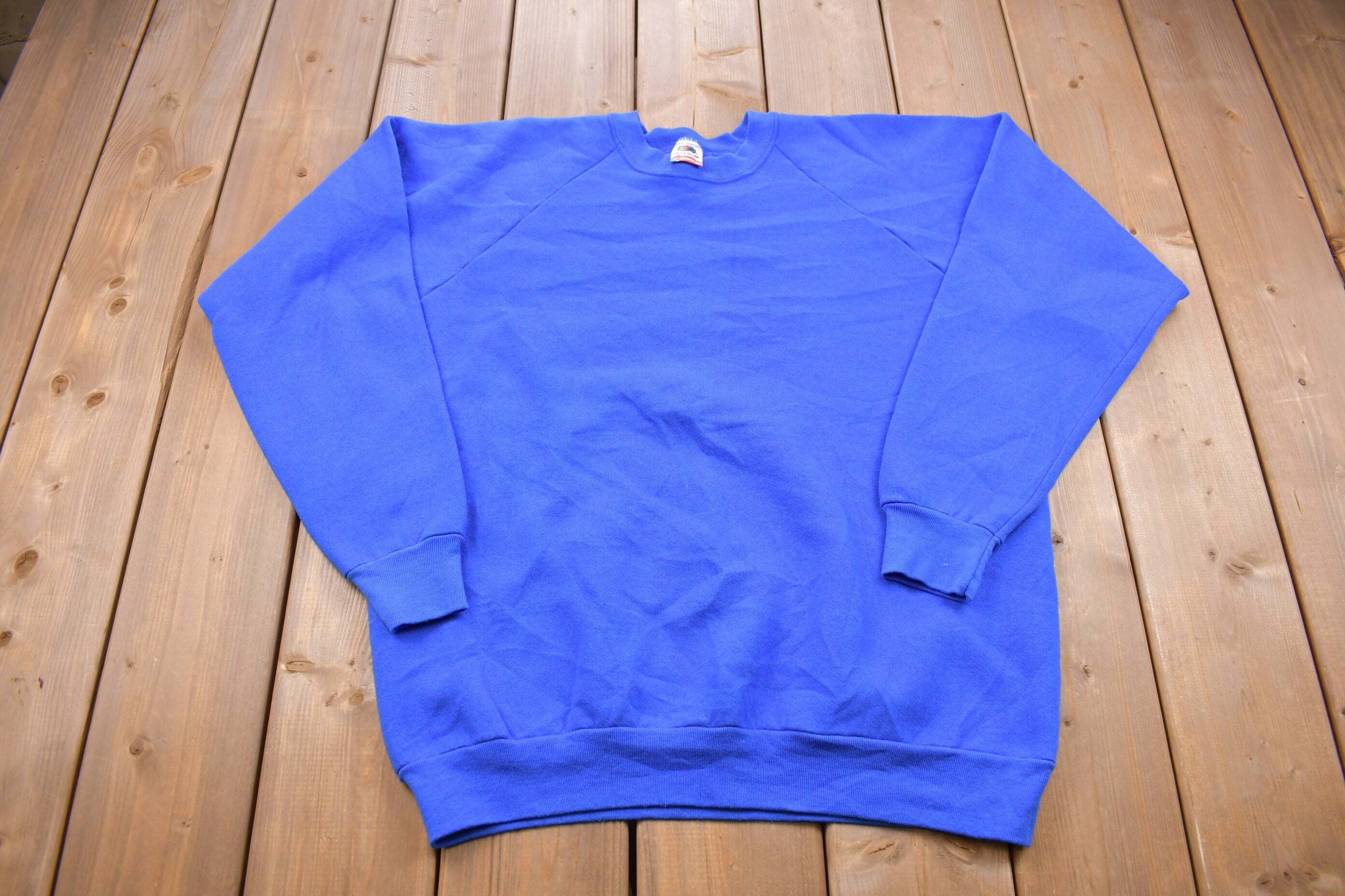 Vintage 1990s fruit of the Loom Blank Raglan Crewneck Sweatshirt