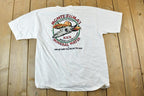 Vintage 1980s Crazy Shirts Montezumas Mineral Water Souvenir Single Stitch Graphic Print T-Shirt