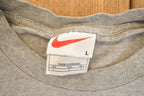 Vintage 1990s Nike Athletics Graphic Print Sportswear T-Shirt Men's L