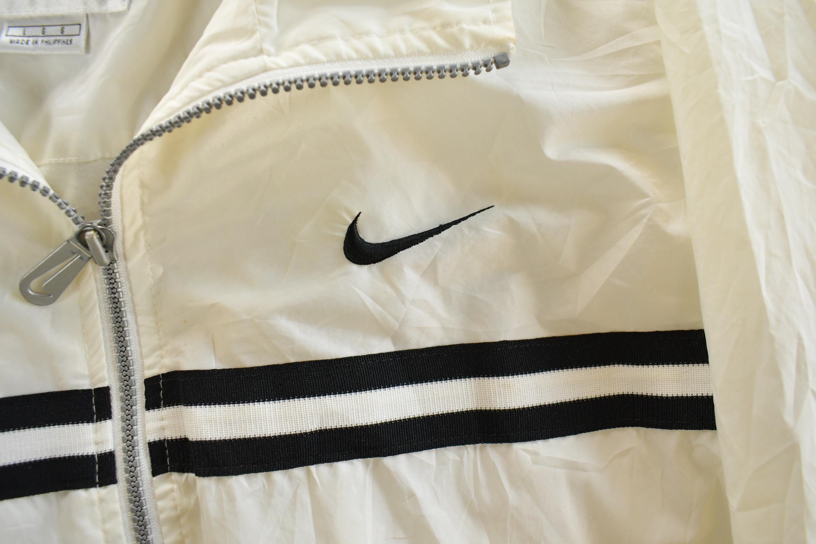 Vintage 1990s Nike Mini Swoosh Windbreaker Jacket Men's Large