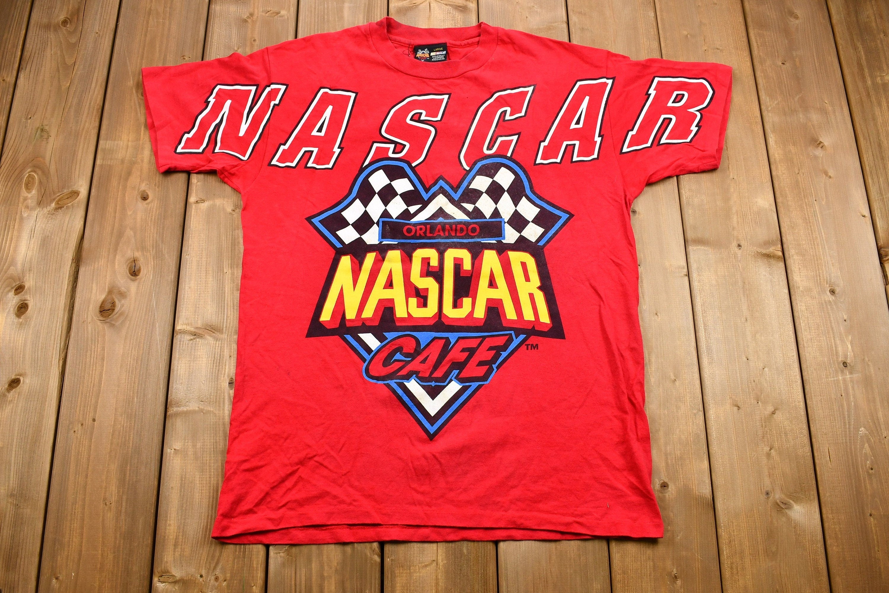 Vintage 1990s NASCAR Café Orlando Graphic T-Shirt / Single Stitch / Racing / 90s Streetwear / Life's A Race The Best Times Win / Sportswear
