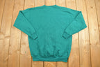 Vintage 1990s Blank Nucleus Turquoise Crewneck Sweatshirt