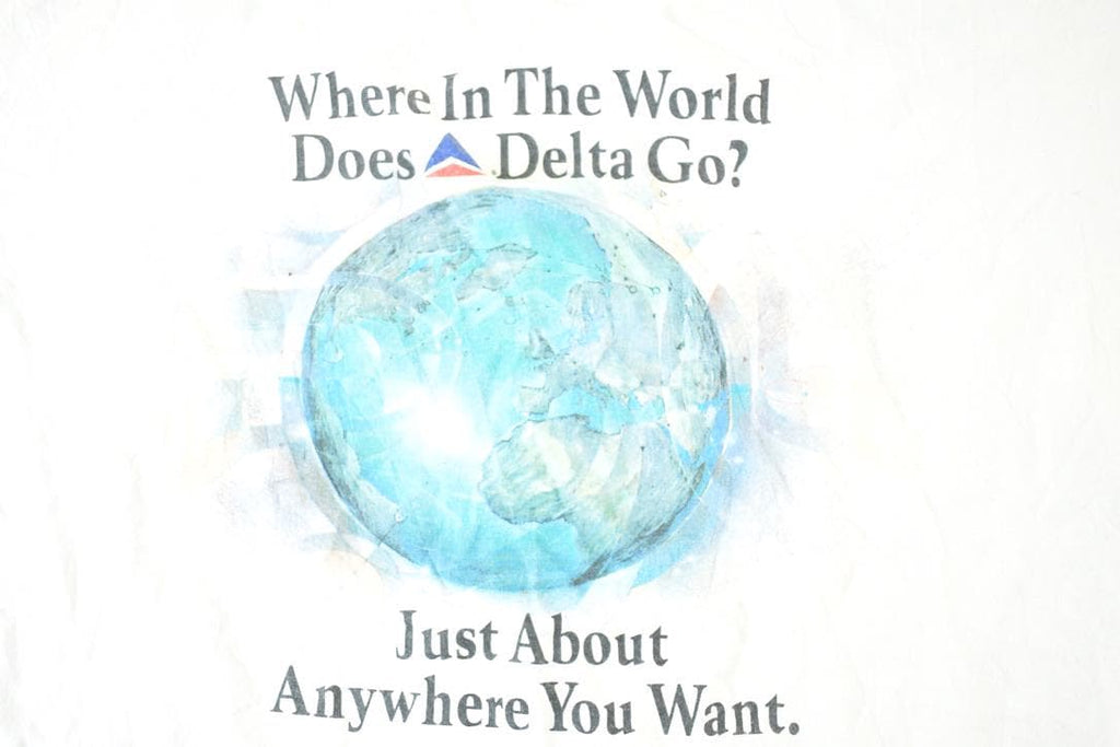 Vintage 1990s Where In The World Does Delta Go Souvenir T-Shirt Men's L