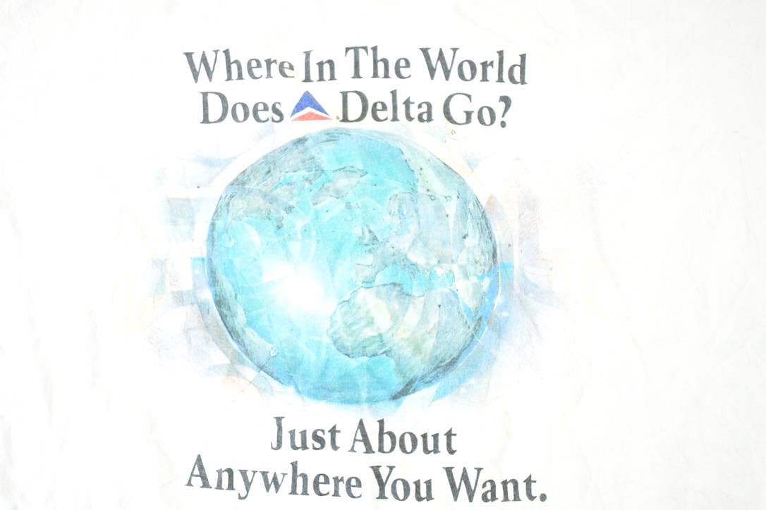 Vintage 1990s Where In The World Does Delta Go Souvenir T-Shirt Men's L