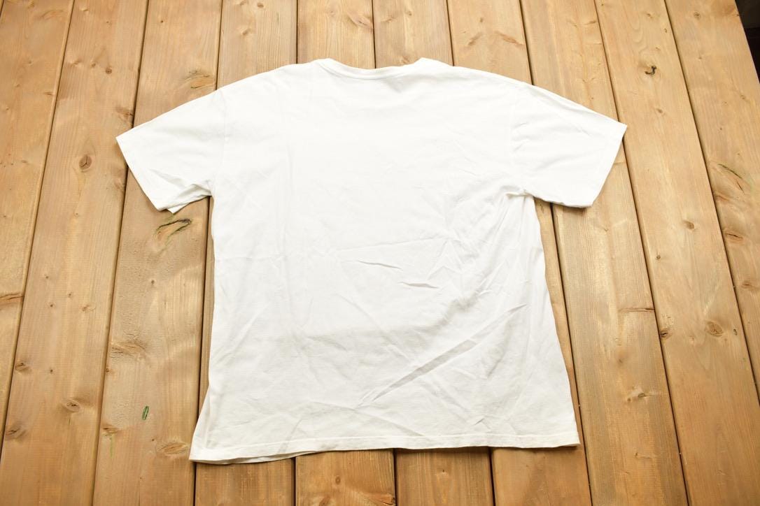 Vintage 1990s Grey Tag Nike Graphic T-Shirt Made In USA