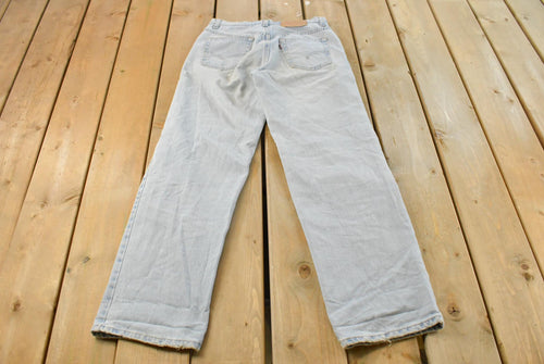 Vintage 1990s Levi's 565 Loose Wide Leg Denim Jeans Women's 28 x 31 / Light Wash / Vintage Denim / Made In USA / 90s Levi's / Distressed