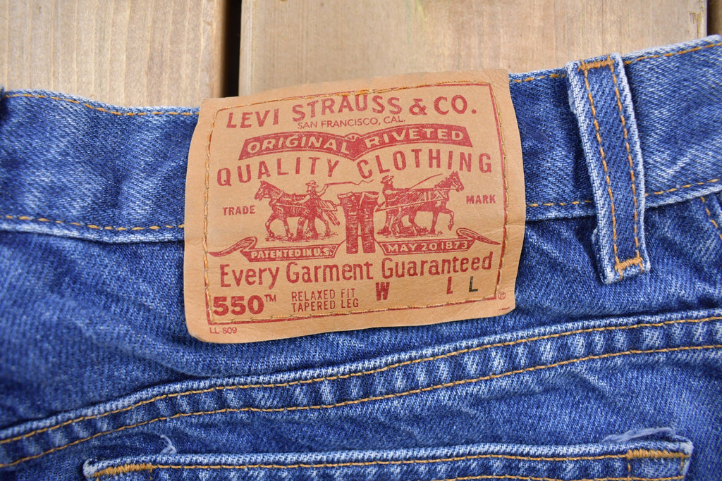 Vintage 1990s Levi's 550 Red Tab Dark Blue Jeans Size 31 x 31