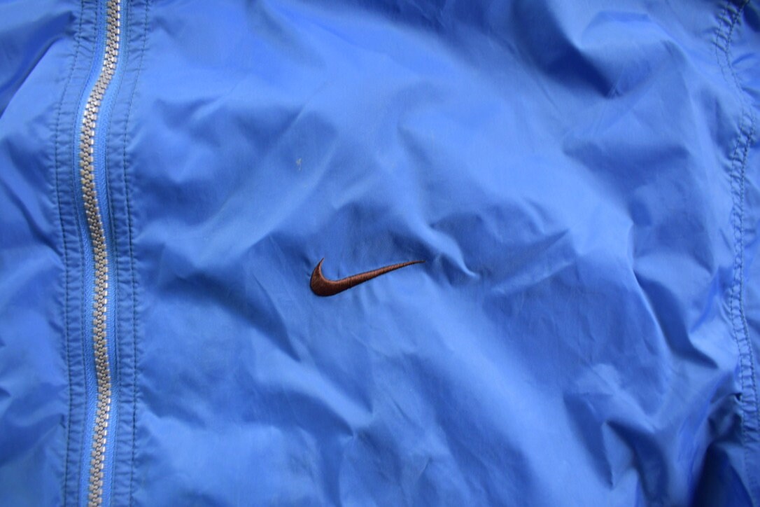 Vintage 1990s Nike Embroidered Mini Swoosh Windbreaker Jacket