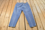 Vintage 1990s Levi's 551 Relaxed Tapered Fit Denim Jeans Women's 33 x 30 / Distressed Jeans / Made in USA