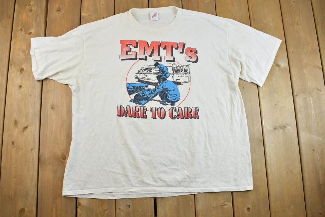 Vintage 1980s EMT Dare To Care Souvenir T-Shirt