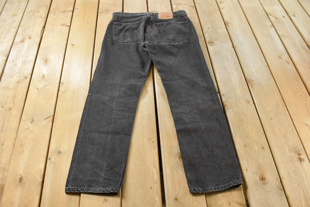 Vintage 1990s Levi's 505 Regular Fit Denim Jeans Men's 33 x 31 / 90s Levi's / Distressed Sun Faded Jeans