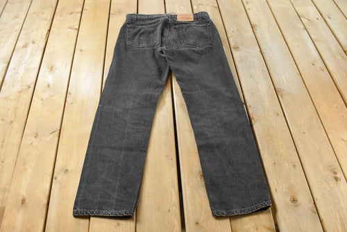 Vintage 1990s Levi's 505 Regular Fit Denim Jeans Men's 33 x 31 / 90s Levi's / Distressed Sun Faded Jeans