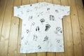 Vintage 1990s Animal Tracks All Over Print Graphic T-Shirt