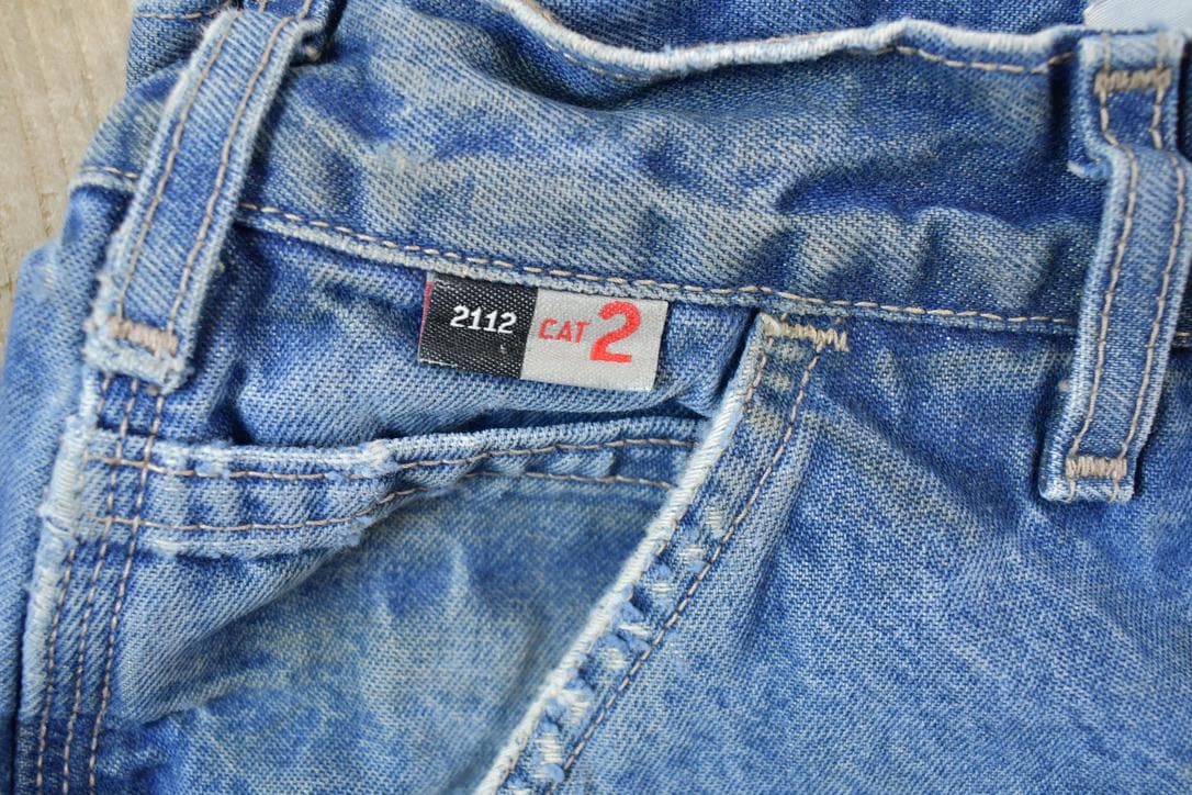Vintage 1990s Carhartt Flame Resistant Denim Work Pants Size 34 x 32