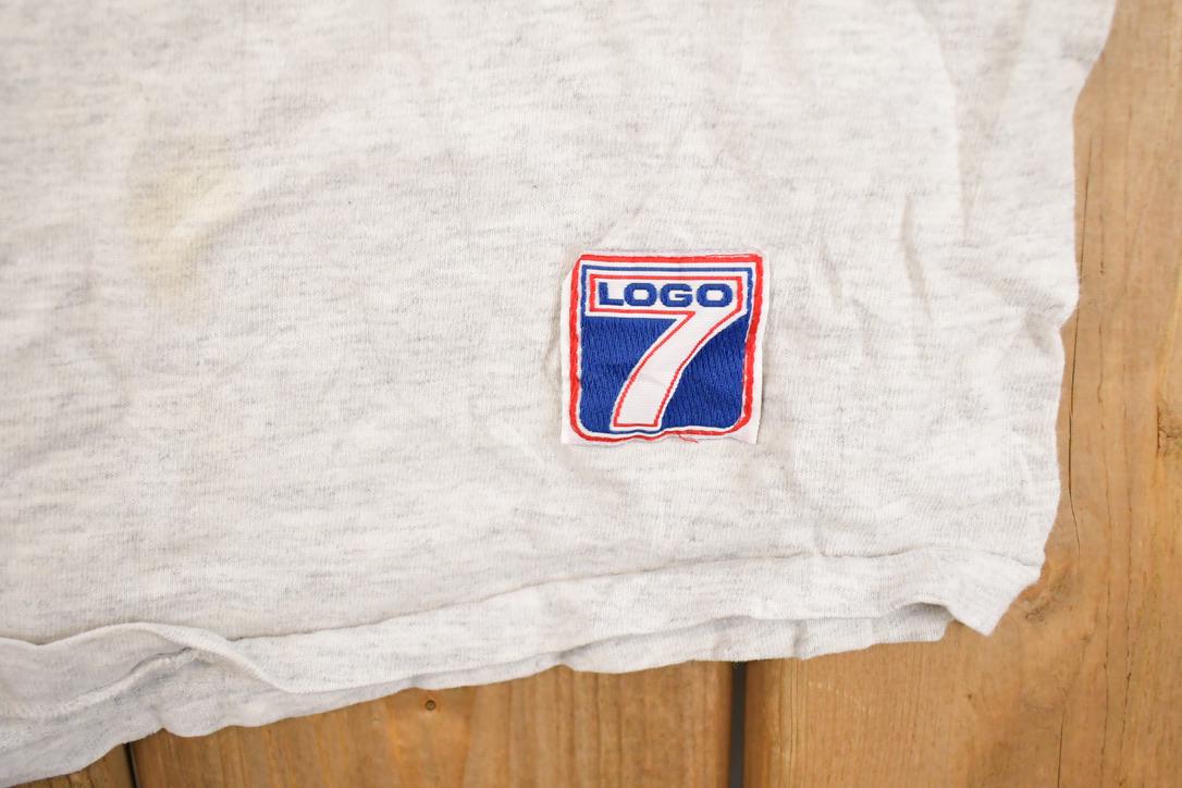 Vintage 1991 Logo 7 Minnesota Superbowl Graphic Print Souvenir Football T-Shirt Men's L