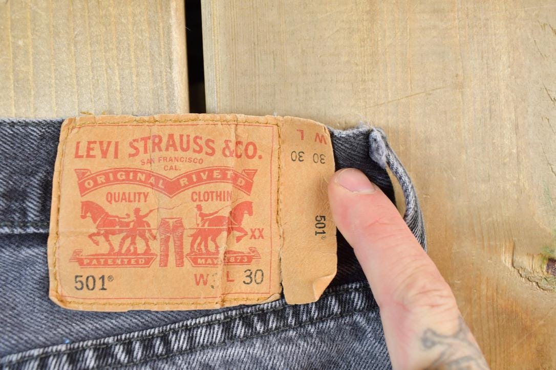 Vintage 1990s Levi Strauss 501 Red Tab Light Wash Black Denim Jeans Size 30 x 30