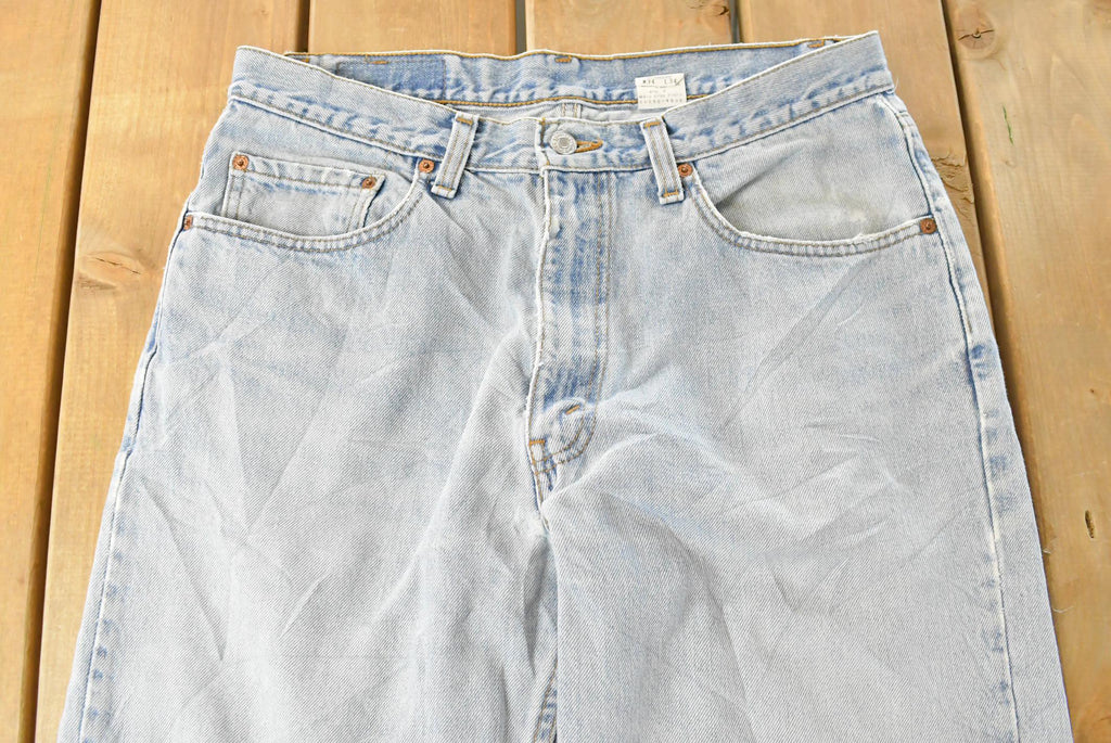 Vintage 1990s Levi's Distressed 550 Relaxed Fit Denim Jeans Men's 33 x 33 / 90s Levi's / Blown Out Sun Faded Jeans
