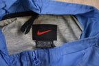 Vintage 1990s Nike Mini Swoosh Windbreaker Jacket
