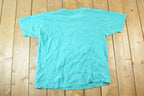 Vintage 1990s Niagara Falls Canada Floral Print Souvenir T-Shirt Men's L