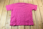 Vintage 1990s Bright Pink Lacoste Alligator Logo Single Stitch Textured Pocket T-Shirt
